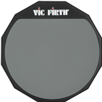 A six-inch circular Vic Firth single-sided drum practice pad with a soft gray gum rubber surface, wooden base, and printed black brand logo.